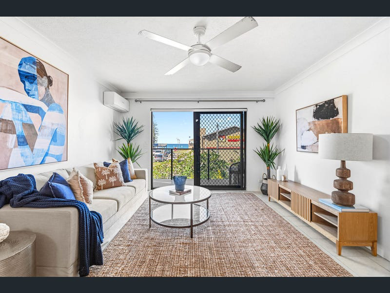 Styled open-plan living and dining room with ocean outlook at 5/26 Albatross Avenue, Mermaid Beach